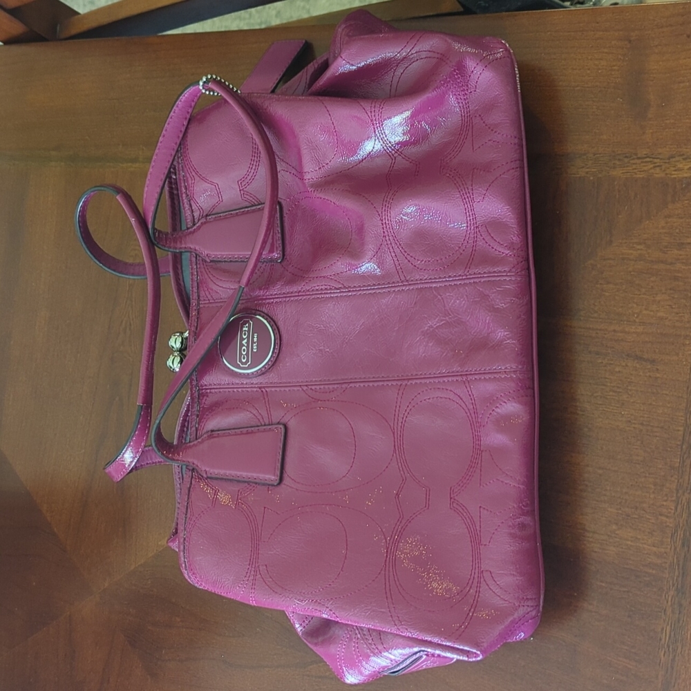 Magenta Coach Purchase